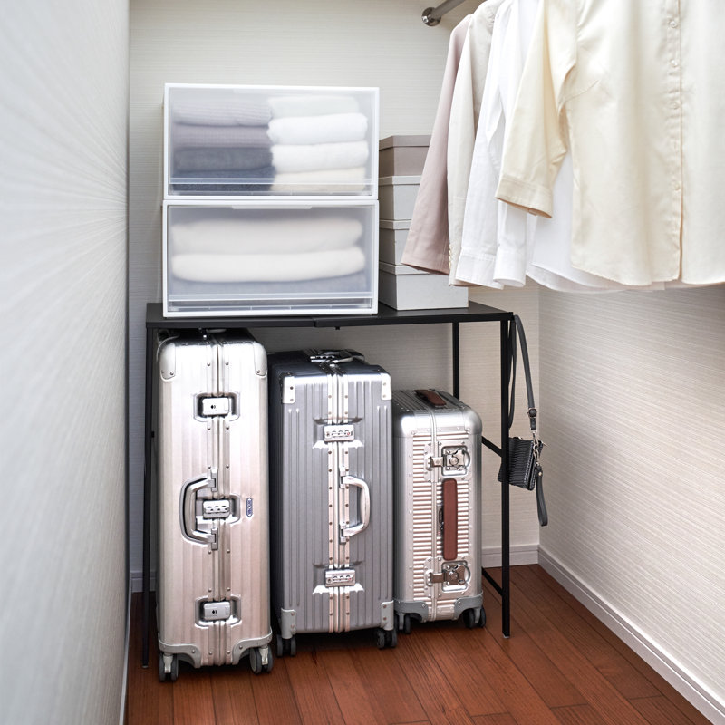 Expandable Black Steel Suitcase Rack with Storage Bar