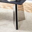 Table en marbre noir et 6 chaises en polyuréthane blanc avec structure stable pour une base familiale
