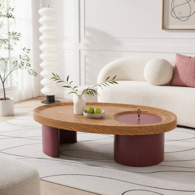 Table basse ovale en bois avec rangement et pattes rouges remarquables