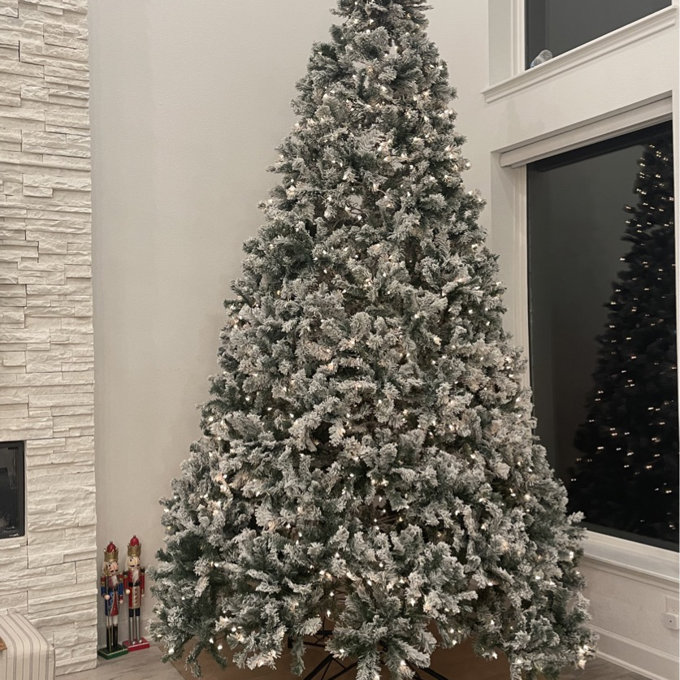 Pre-lit Flocked Artificial Christmas Tree - 7.5 ft.