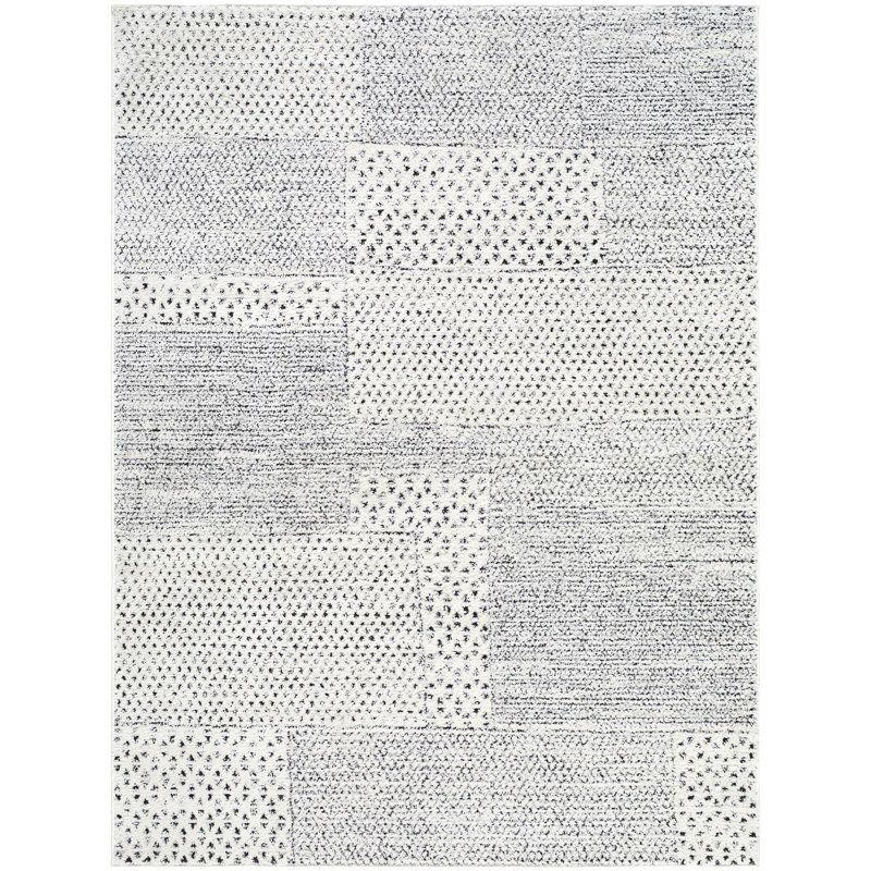 Ivory and Black Geometric Patchwork Area Rug, 6'7" x 9'