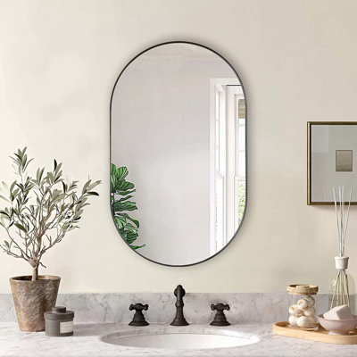 Miroir ovale en métal