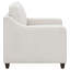 Fauteuil beige rembourré incliné