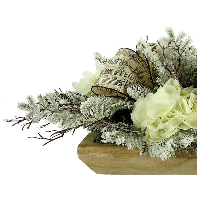 Arrangement d'hortensias en ratine polie Racine