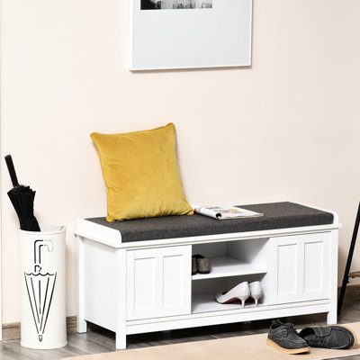 Repose-pieds de rangement pour le hall d'entrée avec portes coulissantes, tablettes réglables, 6 compartiments et siège rembourré, peut contenir 1 paire, blanc