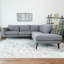 Canapé modulaire gris avec méridienne pour salon moderne