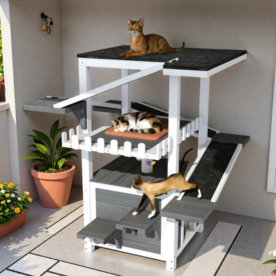 Maison pour chat d'extérieur à 4 niveaux avec toit imperméable, 2 portes, 4 rampes d'escalade, plusieurs plateformes de saut, rideau en PVC, poteau à griffes et jouet à poisson suspendu