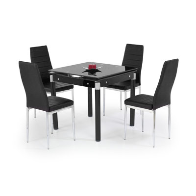 Abdulhakeem Glass Top Metal Base Dining Table