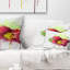 Coussin lombaire floral avec éclaboussures de peinture