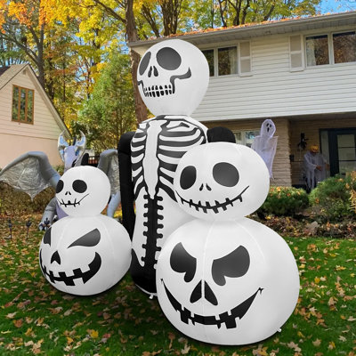 The Holiday Aisle® 6 Ft Inflatable Halloween Skeleton Trio With Built-in Led Lights
