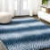 Allerie Animal Print Navy/Cream Area Rug