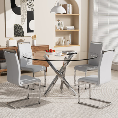 Ensemble de table de salle à manger, table ronde en verre trempé et 4 chaises rembourrées.