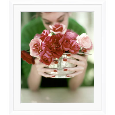 Vogue Magazine, "A Woman Holding a Bowl of Roses," John Rawlings, June 1, 1952 Framed Print