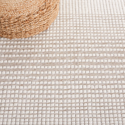 Tapis beige noué à la main
