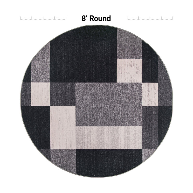 Tapis gris, noir et blanc touffeté à motif géométrique Akieba, Rond 8 pi