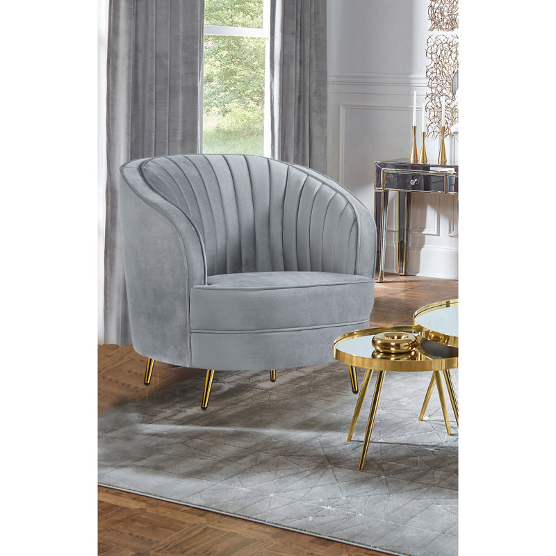 Chaise capitonnée grise et dorée