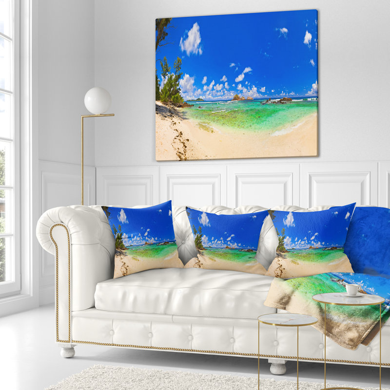 Photographie de paysage, plage tropicale avec coussin lombaire