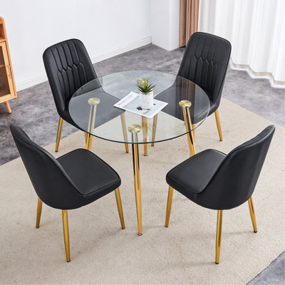 Table And Chair Set.36 Inch Diameter Modern Luxury Glass Dining Table And Chair Set - Gold Frame, Metal Legs.Four Black PU Chairs With Simple Line Designs On The Backrest.