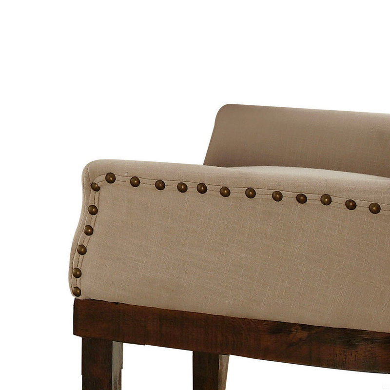 Fauteuil avec garniture cloutée