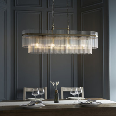 Geira 4lt Pendant light finished in Ant. Brass