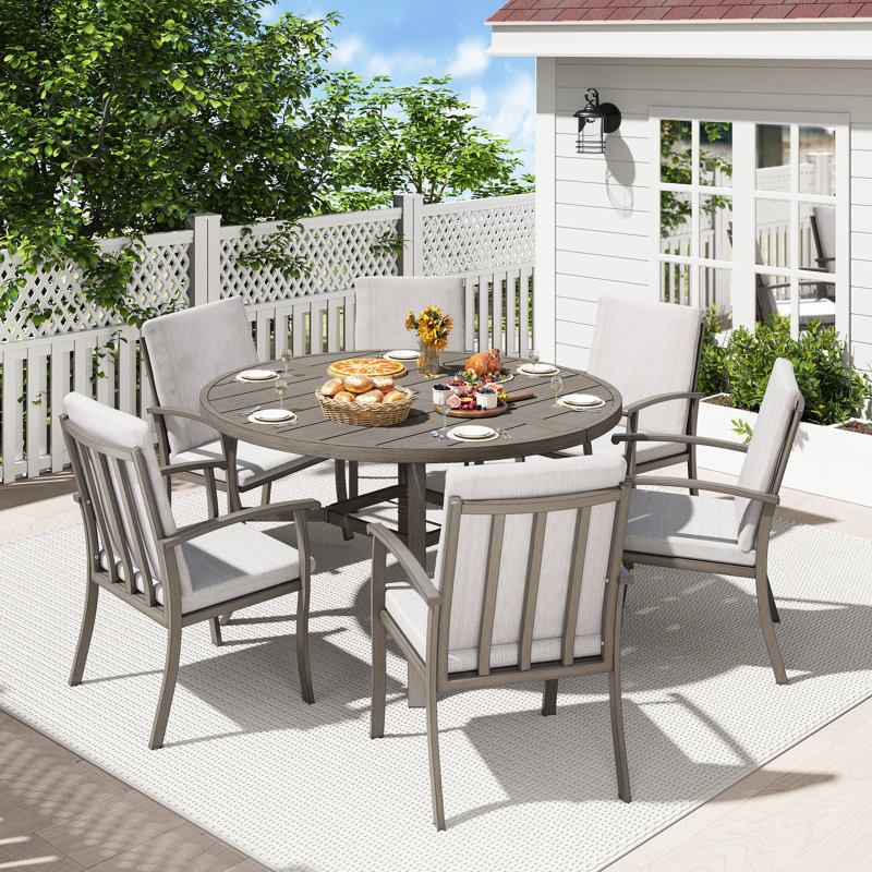 Ensemble repas 7 pièces en aluminium gris avec table ronde et coussins lavables gris clair Moffett