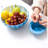 Blue petal-shaped fruit bowl with stand