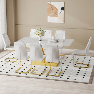 Ensemble de table et de chaises. Ensemble de table de salle à manger en verre trempé blanc de style montagne de luxe moderne de 71 po x 35,4 po avec chaises en polyuréthane. Apportez une expérience de maison confortable à la cuisine, à la chambre à