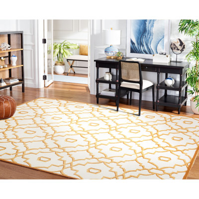 Tapis ivoire / brun clair d'intérieur/extérieur crocheté à la main à motif géométrique Maeve