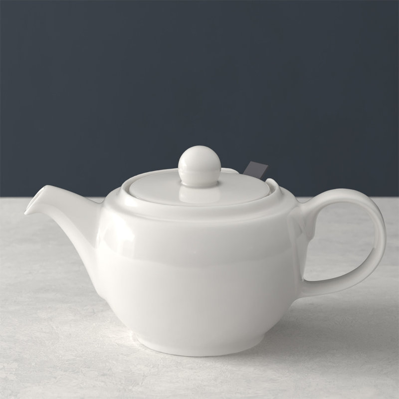 Elegant White Porcelain Teapot with Lid and Strainer