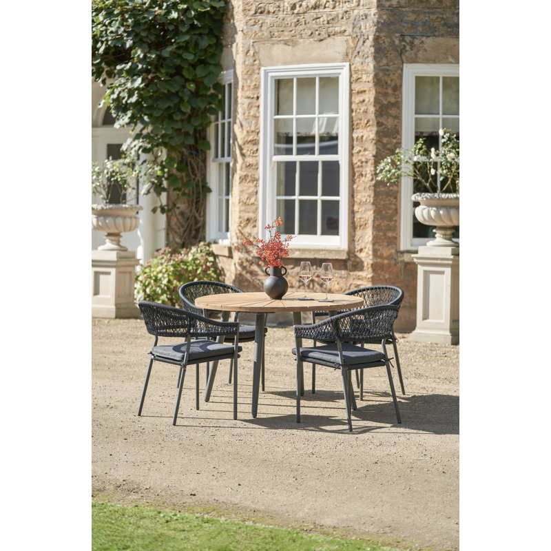 Taopi 4 - Person Acacia Patio Dining Set with Round Table , Cushions Included