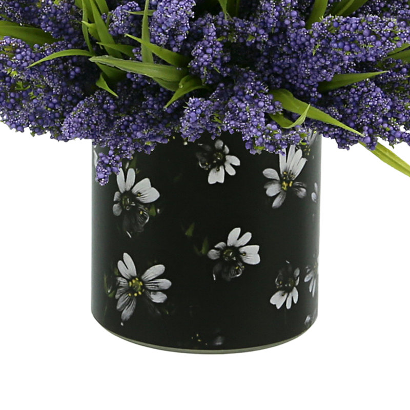 Heather Arrangement In A Glass Vase With Flower Label