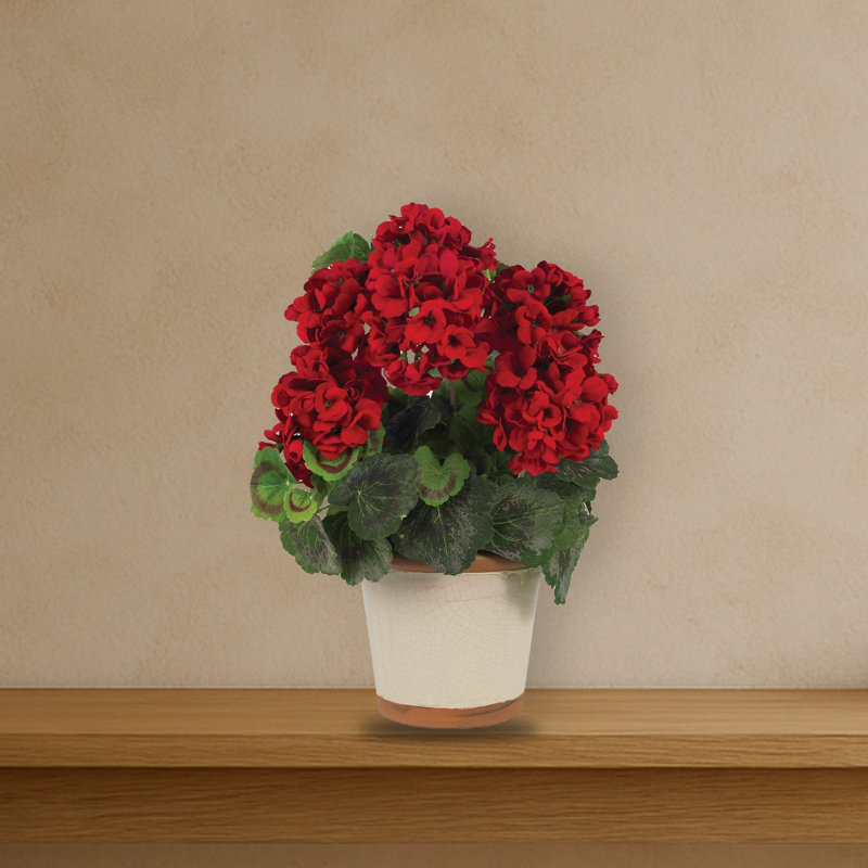 Géranium en soie avec vase