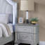 Table de chevet 2 tiroirs Elegance avec façade décorative scintillante, parfaite pour les chambres à coucher modernes et les solutions de rangement élégantes.