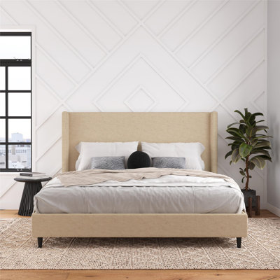 Birzer King Upholstered Wingback Bed