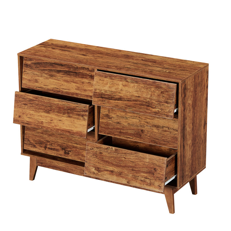 La commode double 6 tiroirs présente un design rétro et biseauté