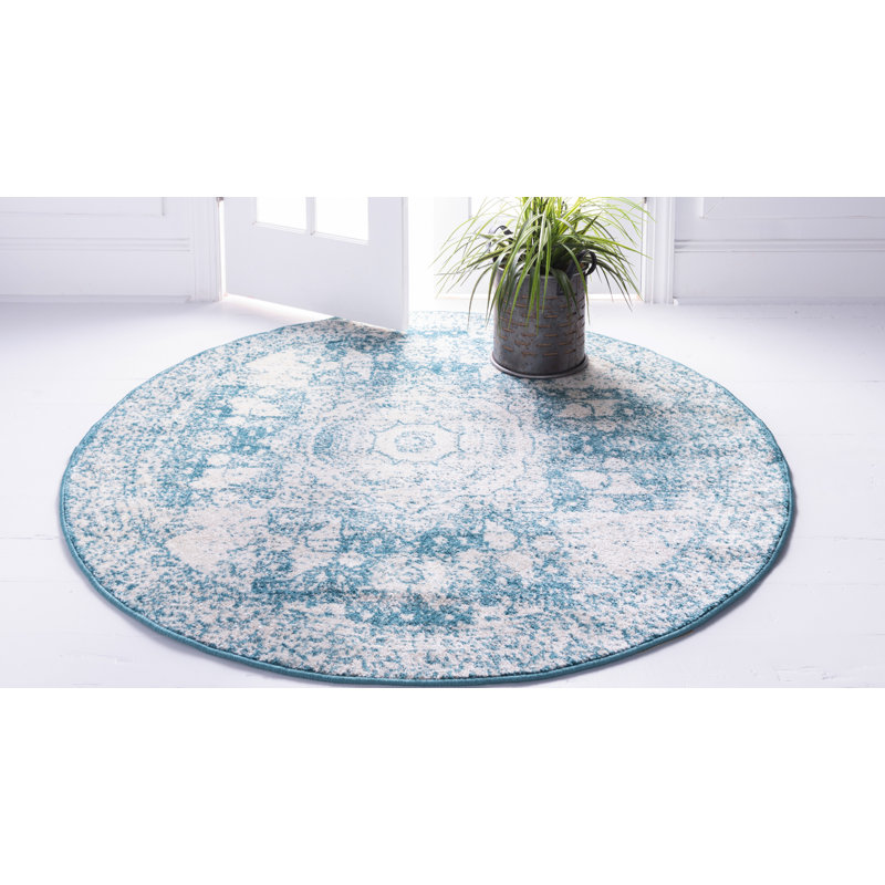 Tapis turquoise à motif géométrique Rizo, Rond 8 pi
