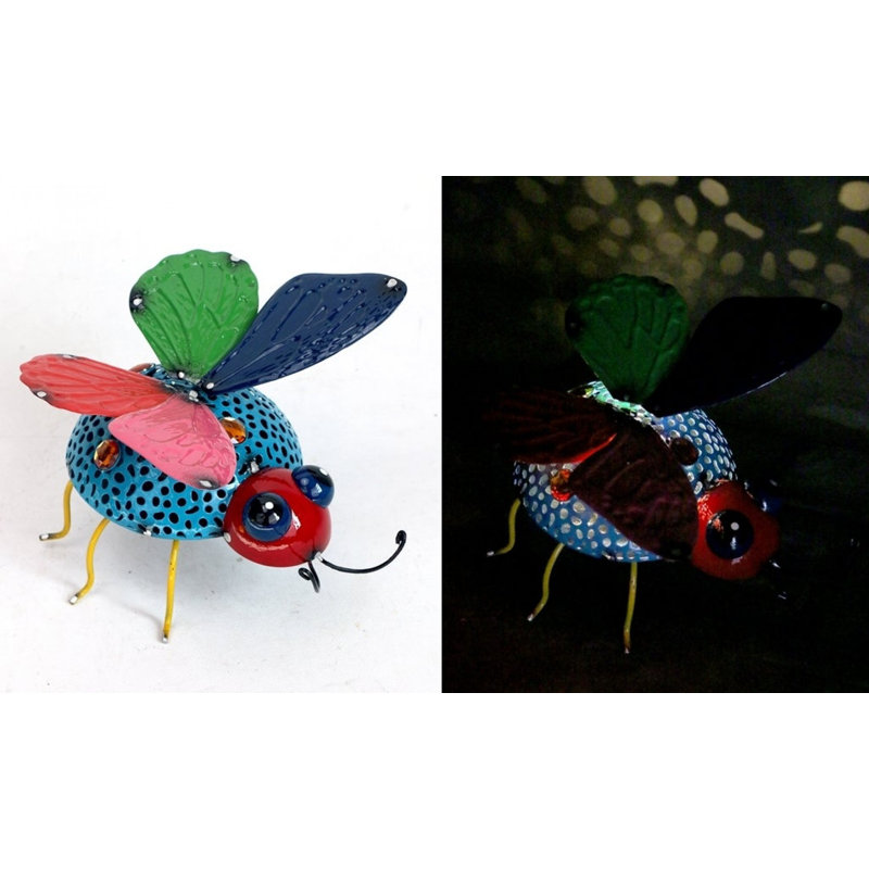 Figurine DEL coccinelle avec ailes de papillon