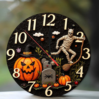mummy flies broom past jackolantern