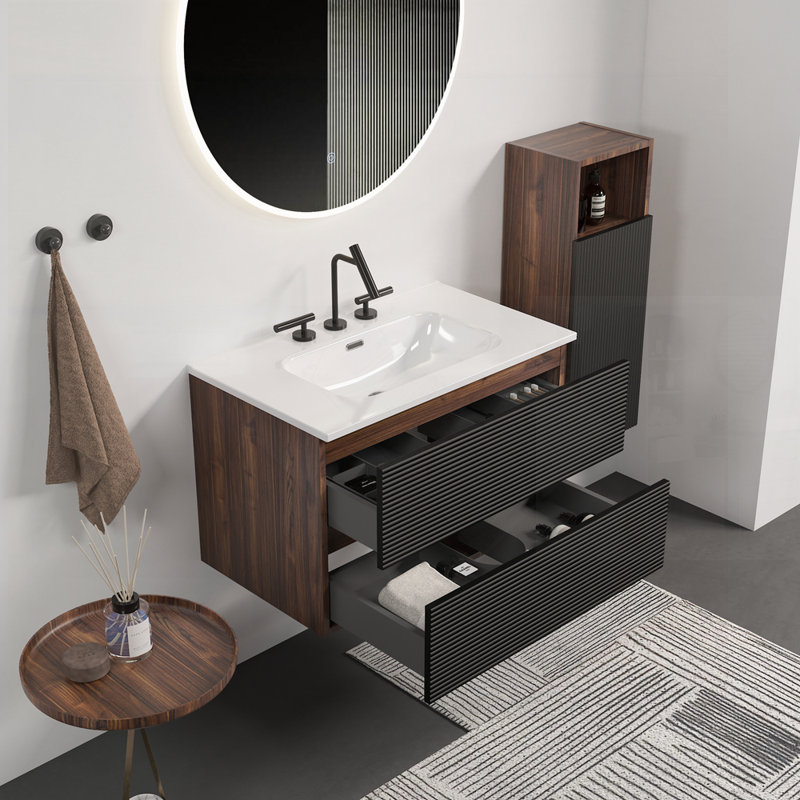 Meuble-lavabo mural noir et noyer doux avec lavabo en céramique intégré, trop-plein et grand rangement pour les salles de bain modernes.