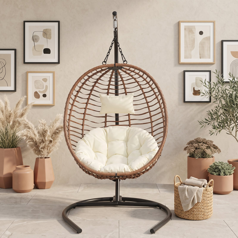 Fauteuil à œufs pliable extérieur / intérieur avec osier PEHD, structure en fer, coussin épais, appui-tête réglable et sangle de sécurité