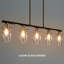 Lustre linéaire moderne à 5 lumières noir et or, à intensité variable, pour îlot de cuisine ou salon.-1398208936