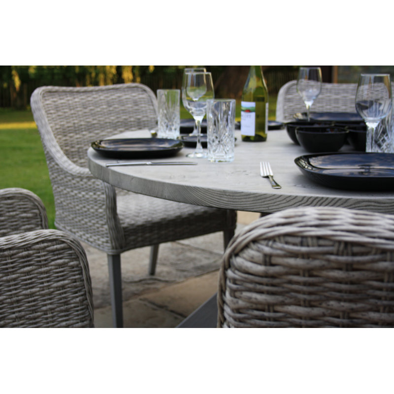Luke 6 - Person Patio Dining Set Round Table with Cushions Included