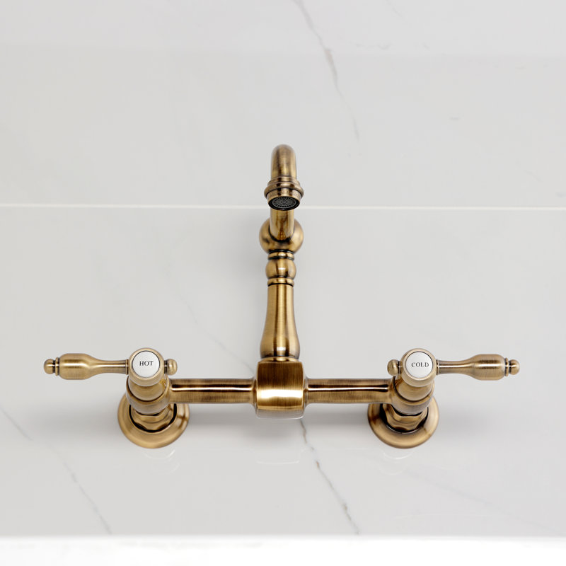 Kingston Brass Tudor Double-Handle 2-Hole Wall-Mount Bridge Kitchen Faucet, Antique Brass