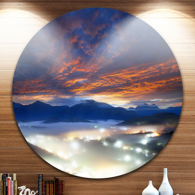 " Fiery Clouds And Lit-up Villages "