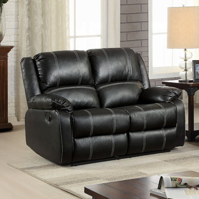 Causeuse en cuir synthétique noir avec fonction inclinable et accoudoirs coussinés Zuriel