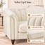 Fauteuil capitonné blanc, avec accoudoirs arrondis et garniture cloutée.-1121966332