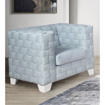 Chaise confortable en bleu recouverte de chenille: structure en bois, rembourrage en mousse, fauteuil inclinable élégant: tissu en chenille, base solide
