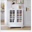 Buffet minimaliste blanc avec portes doubles en verre et tiroir