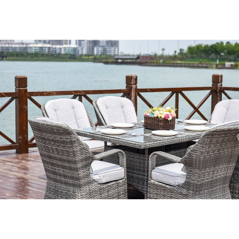 Algird 6 - Person Wicker Patio Dining Set with Rectangular Table , Cushions Included, Gray