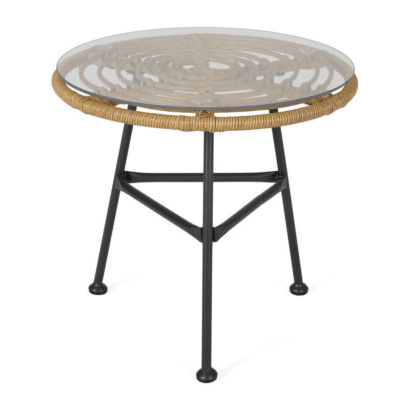 Table contemporaine avec plateau en verre translucide et design épuré